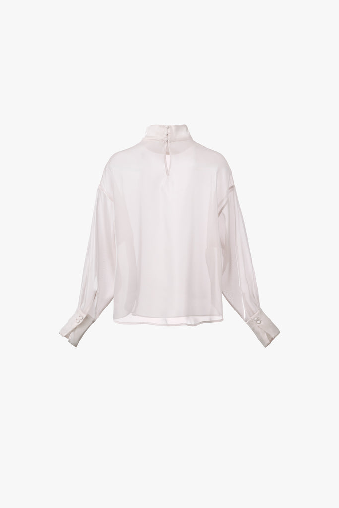 VEILED GLOW BLOUSE